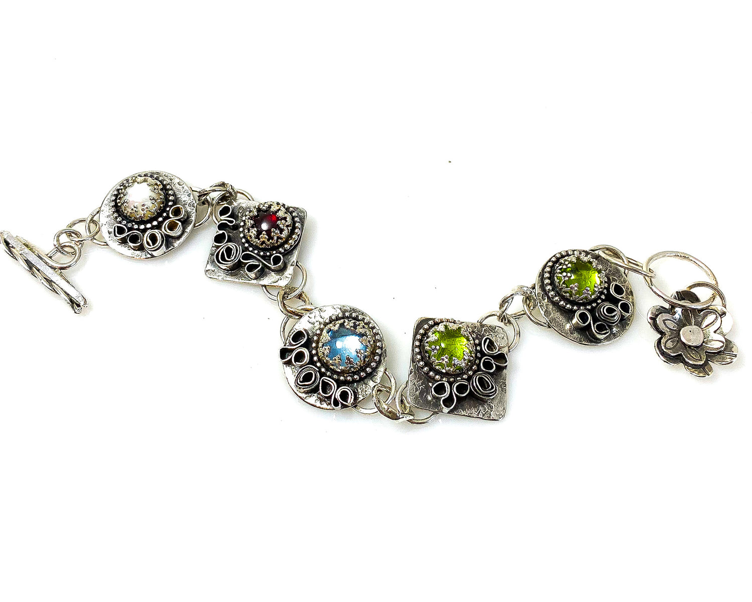 Swiss Blue Topaz, Peridot, Mother of Pearl  Birthstone Bracelet. Sandra Anne Designs, High Quality Handcrafted Jewelry made by a Roycroft Artisan